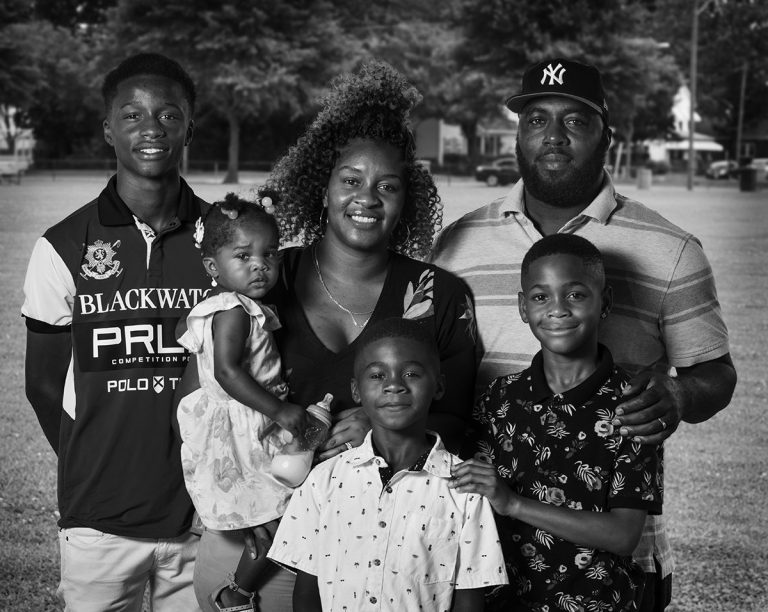Headshot of Wanda Harry and her family