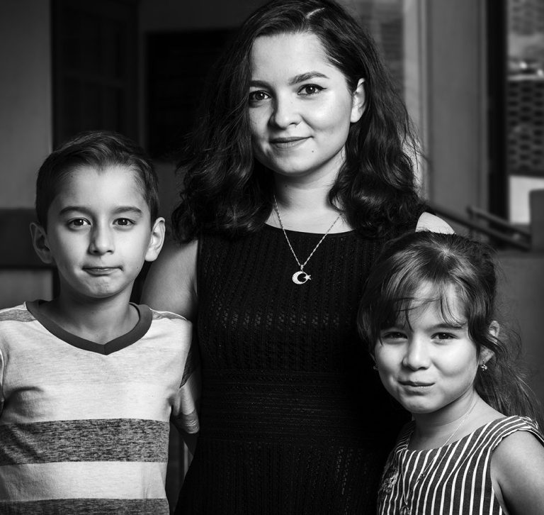 Headshot of Zukhra Djalilova and her children