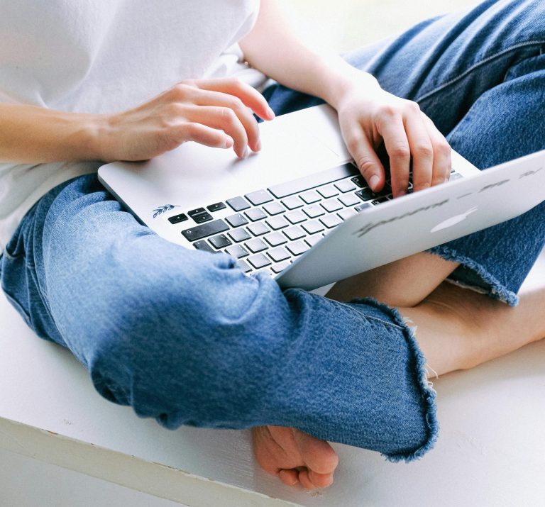 person using laptop
