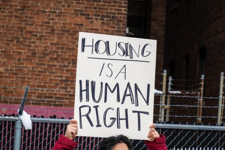 Protest sign that reads Housing is a human right