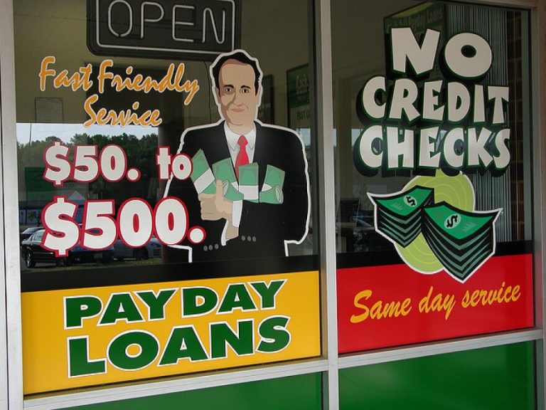 Payday loan advertising in window