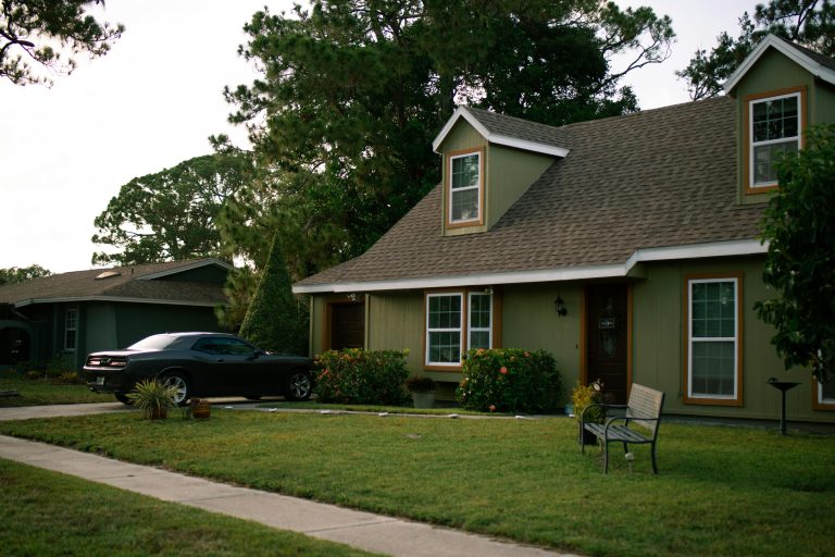 outside of house with car in driveway