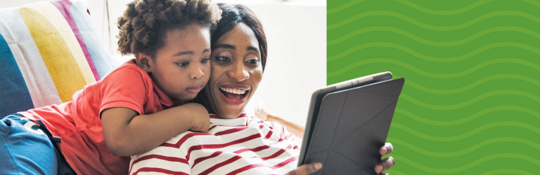 woman and son looking at tablet