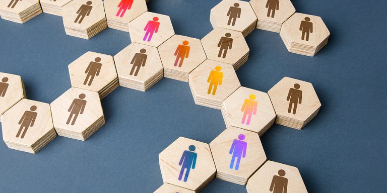 Six side wooden pieces with people, connecting in a puzzle